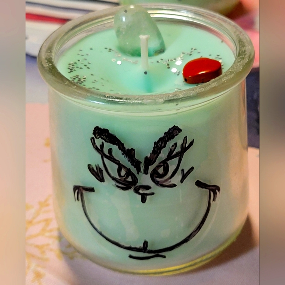 Small batch, hand poured, and hand painted Grinch Christmas Candles